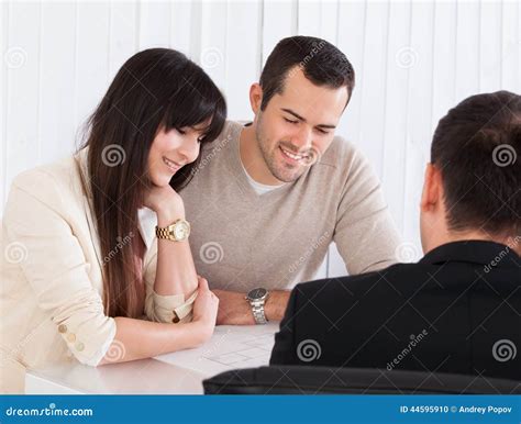 Happy Young Couple Discussing with Consultant Stock Photo - Image of business, advice: 44595910