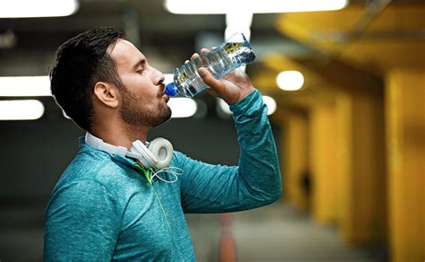 Man Drinking Water Bottle
