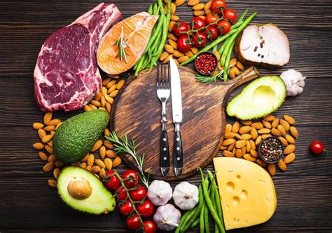 What specific role do healthy fats play as a primary “fuel” source in men’s diets, particularly concerning sustained energy and hormone regulation?