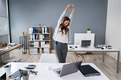Standing Stretch At Desk Stock Photos, Pictures & Royalty-Free Images ...