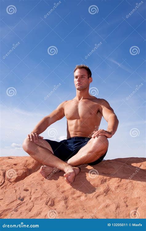 Man meditating outdoors stock image. Image of muscular - 13205011