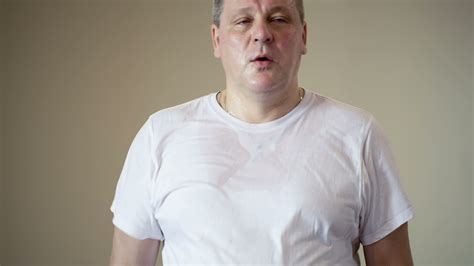 Tired man in a gym 28282577 Stock Video at Vecteezy