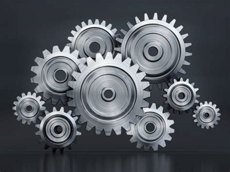 Gears Turning Stock Photos, Pictures & Royalty-Free Images - iStock