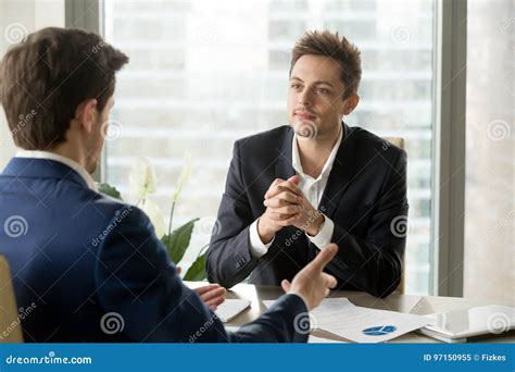 Attentive Businessman Listening To Business Partner Talking Duri Stock Image - Image of meeting ...