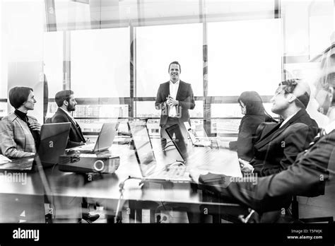 Successful manager leading corporate business team office meeting Stock ...