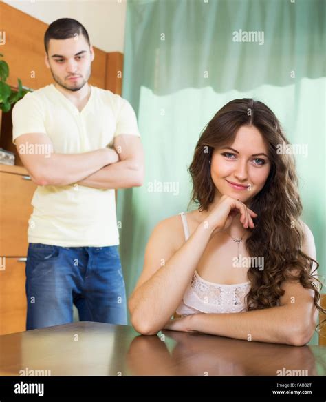 Young couple having serious talking in home interior. Focus on crafty ...