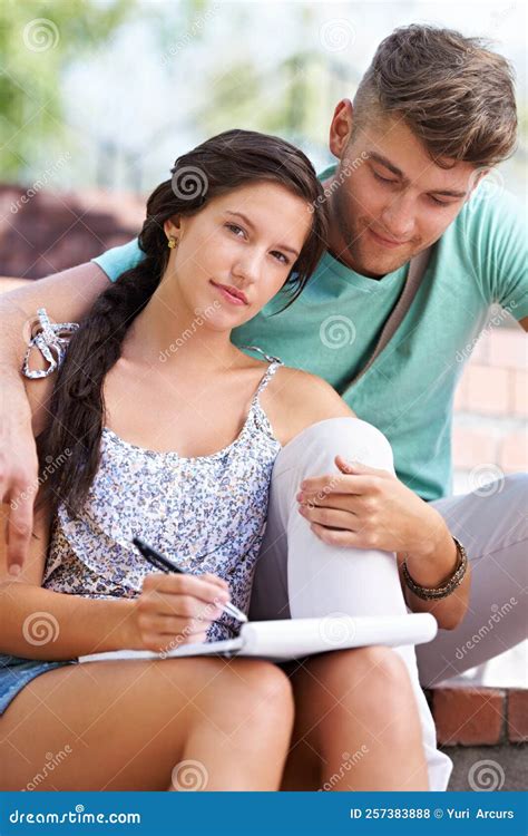 Finding the Answers Together. a Young Couple Studying Together on the ...