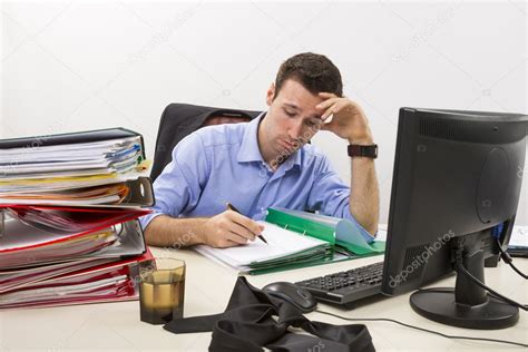 Stressed businessman at work — Stock Photo © Photosebia #18984521