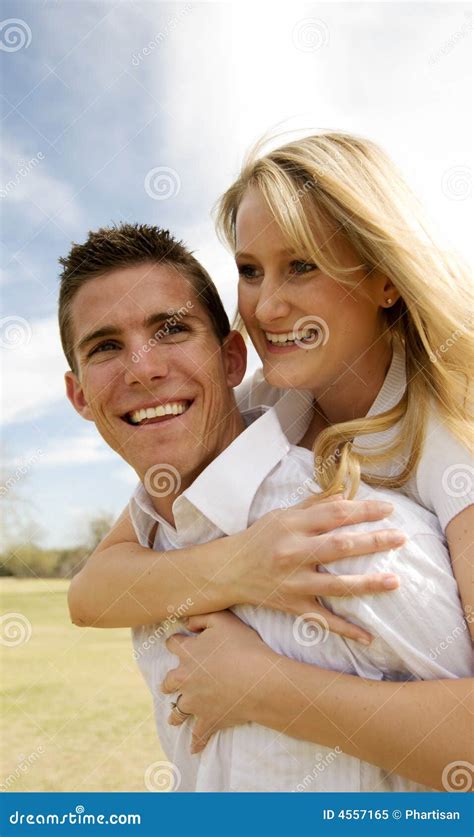 Young couple in love stock image. Image of outdoors, beautiful - 4557165