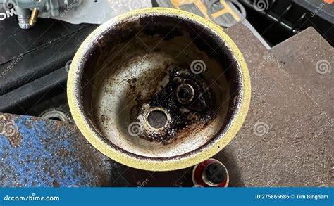 Varnish Covered and Corroded Small Engine Carburetor Bowl Stock Photo - Image of corrodid, mower ...