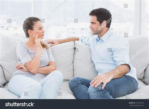 Couple Having Serious Discussion On Couch Stock Photo 181299146 | Shutterstock