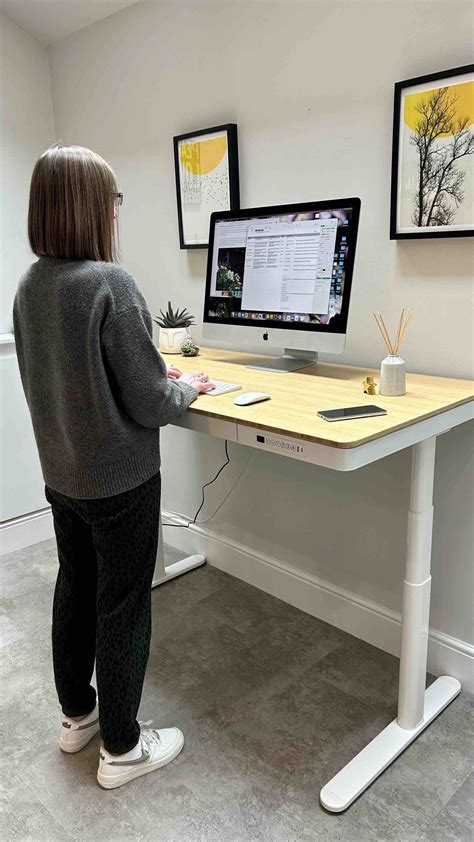 Creating an ergonomic workstation with the Q8 Flexispot standing desk - Growing Family