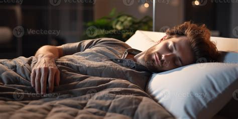 man sleeping peacefully in bed 44550585 Stock Photo at Vecteezy