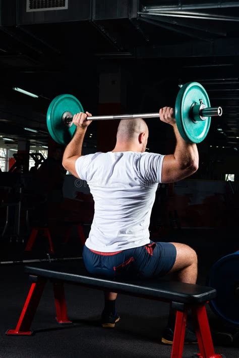 Male Athlete Lifts the Barbell Stock Image - Image of body, muscle ...