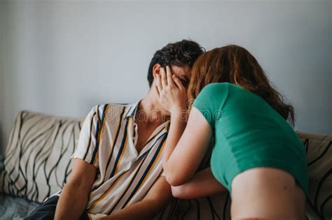 Couple Sharing an Intimate Moment on a Cozy Sofa Stock Photo - Image of ...