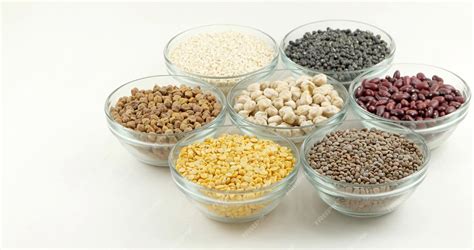 Premium Photo | Closeup shot of various lentils and legumes in glass ...