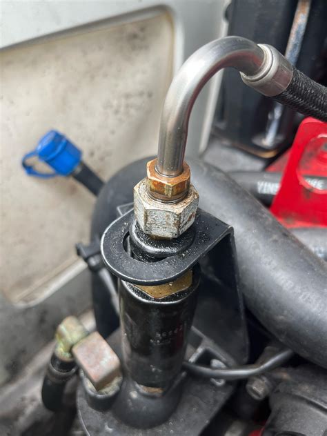 Cant disconnect top end fuel line on fuel pump. starting to round the ...