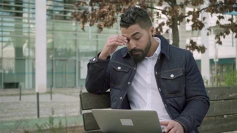 Focused man thinking and working with la... | Stock Video | Pond5