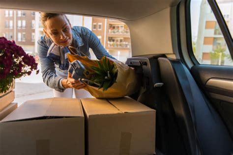 Unloading Trunk Of Car Stock Photos, Pictures & Royalty-Free Images ...