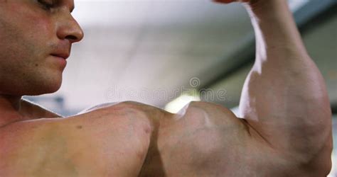 Man Flexing Biceps in Studio Stock Footage - Video of motivation ...