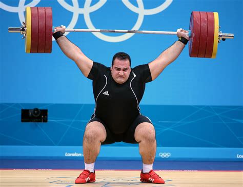 Iranian Weight Lifter Wins Gold in Men’s Super-Heavyweight Division ...