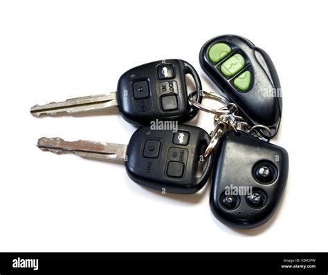 Two car keys with remote on white background Stock Photo - Alamy