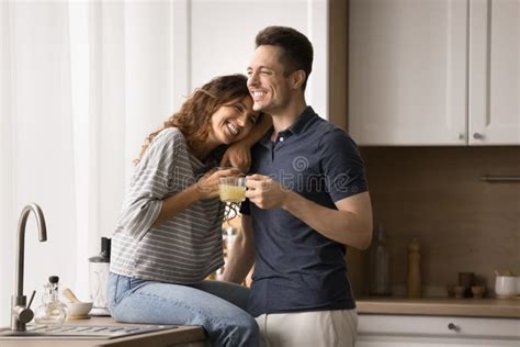 Happy Married Couple in Love Hugging in Kitchen Stock Image - Image of ...