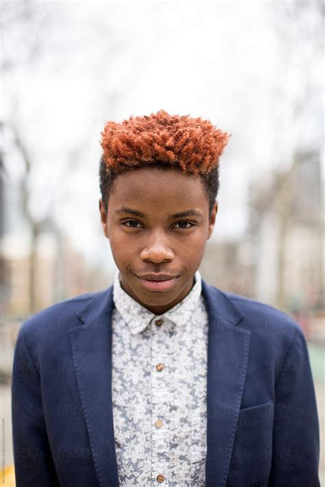 «A Young Black Man In A Blue Suit.» del colaborador de Stocksy «Bowery Image Group Inc.» - Stocksy