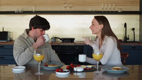 Happy Young Couple in Love Laughing, Laughing, Drinking Tea or Coffee ...